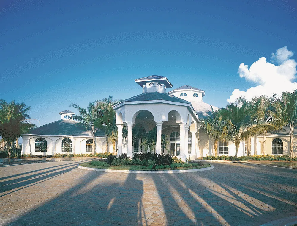 Domed clubhouse entry with a circular drive