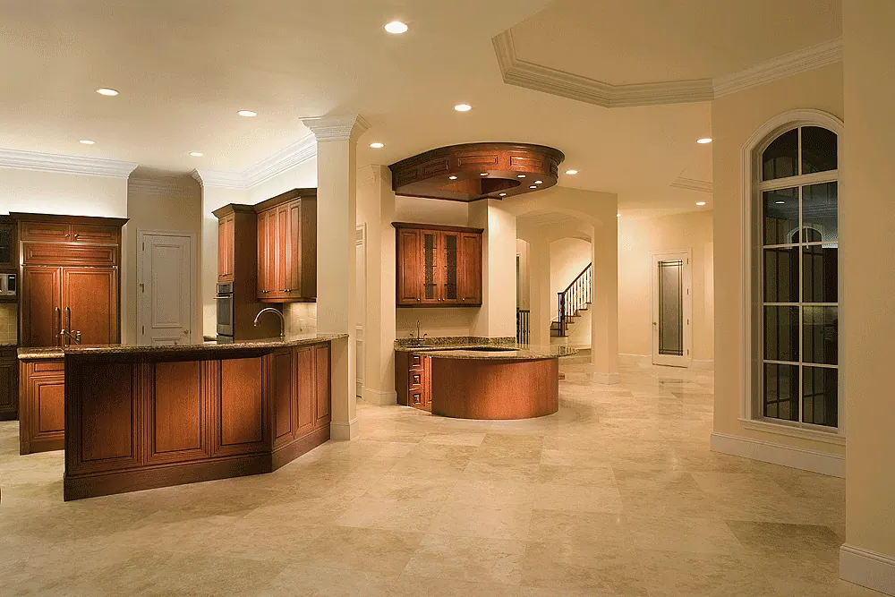 Large kitchen with two islands under a tray ceiling