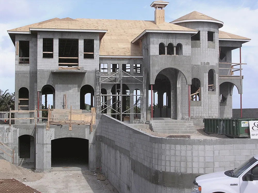 Masonry shell of a Mediterranean house with arched openings